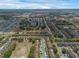 Expansive aerial shot displaying a sprawling residential neighborhood with community amenities at 4143 Calabria Ave, Davenport, FL 33897