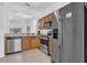 Well-equipped kitchen with stainless steel appliances and ample cabinet space at 4143 Calabria Ave, Davenport, FL 33897