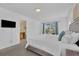 Bright main bedroom featuring ensuite bathroom, television and balcony access at 4143 Calabria Ave, Davenport, FL 33897