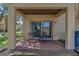 Covered patio with a seating area and sliding glass doors for easy indoor/outdoor living at 4143 Calabria Ave, Davenport, FL 33897