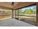 Screened lanai overlooking a private backyard, perfect for enjoying the outdoors at 4406 Brookstone Ct, Orlando, FL 32826