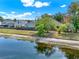 Tranquil view of the pond located behind the home, showcasing the serene outdoor space at 4406 Brookstone Ct, Orlando, FL 32826