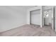 Bright bedroom featuring neutral carpeting and a closet for ample storage space at 46 Silver Falls Cir, Kissimmee, FL 34743