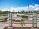 Community park with lake, water features, seating, and the American flag waving proudly at 473 Oviedo Blvd, Oviedo, FL 32765