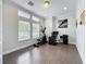 Bright office featuring hardwood floors, recessed lighting, neutral paint, and large windows providing ample natural light at 473 Oviedo Blvd, Oviedo, FL 32765