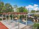 Community playground with shaded seating, structures for climbing and playing with safety ground covering at 473 Oviedo Blvd, Oviedo, FL 32765