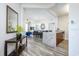 Open-concept living area with modern finishes, dining space and kitchen at 4802 Cayview Ave # 301, Orlando, FL 32819