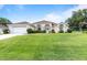 Charming single Gathering home with a well-manicured lawn and an attached two car garage in a quiet neighborhood at 5076 Nw 21St Loop, Ocala, FL 34482