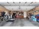 Organized garage with ample storage solutions, work space, and room for vehicles and equipment at 5076 Nw 21St Loop, Ocala, FL 34482