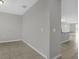 Open concept living space with neutral walls, tile floors, and natural light at 523 Tortugas St, Haines City, FL 33844