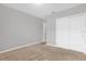 Bedroom features carpeting and large sliding door closet for storage at 531 Tortugas St, Haines City, FL 33844