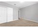 Spacious bedroom features plush carpeting and a large closet for storage at 531 Tortugas St, Haines City, FL 33844