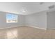 Bright living room features tile floors and a large window with beautiful views at 531 Tortugas St, Haines City, FL 33844