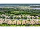 Neighborhood view with landscaped yards, surrounded by solar farm at 578 Newhall Ln, Debary, FL 32713