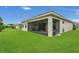 Beautifully maintained lawn and screened patio of this home at 578 Newhall Ln, Debary, FL 32713