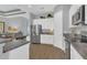 Spacious kitchen with stainless steel appliances, granite countertops, and white cabinets at 578 Newhall Ln, Debary, FL 32713