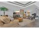 Open floor plan living room boasts hardwood floors, recessed lights, neutral walls, and a view to the lanai at 578 Newhall Ln, Debary, FL 32713