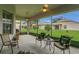 The screened patio with ceiling fans provides a relaxing outdoor living space at 578 Newhall Ln, Debary, FL 32713