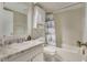 Bathroom featuring a vanity with a sink, toilet, and shower-tub combo at 5833 La Costa Dr # S, Orlando, FL 32807