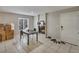 Cozy living room with fireplace, neutral tones, and bright natural light at 5833 La Costa Dr # S, Orlando, FL 32807