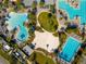 Overhead shot showcasing community pools, sports courts, and recreation areas at 7789 Nemours Pkwy, Orlando, FL 32827