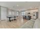 Spacious living room with a large island at 7789 Nemours Pkwy, Orlando, FL 32827