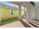 Covered patio with brick pavers and a view of the backyard at 7789 Nemours Pkwy, Orlando, FL 32827