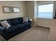 Cozy bedroom with a comfortable seating area, neutral decor, and a well-lit ambiance at 8187 Sw 60Th Ter, Ocala, FL 34476