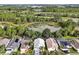 Aerial view of homes showing ponds and natural views at 941 Clear Creek Cir, Clermont, FL 34714