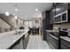 Well-equipped kitchen with granite countertops and stainless steel appliances at 1165 Stratton Ave, Groveland, FL 34736