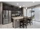 Modern kitchen featuring granite countertops, stainless steel appliances, and island at 1165 Stratton Ave, Groveland, FL 34736