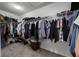 Spacious walk-in closet with ample storage and closet organizer system perfect for keeping things organized at 1165 Stratton Ave, Groveland, FL 34736