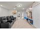 A bonus room features built in theater chairs and themed decor at 1283 Blue Paradise Way, Clermont, FL 34714