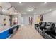 A bonus room features built-in theater chairs, themed decor and dual wall decor at 1283 Blue Paradise Way, Clermont, FL 34714