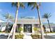 Community building with lush landscaping at 1283 Blue Paradise Way, Clermont, FL 34714
