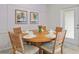 Dining room with round table and six chairs, perfect for Gathering meals and gatherings at 1283 Blue Paradise Way, Clermont, FL 34714