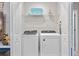 Convenient laundry closet features a full-size washer and dryer at 1283 Blue Paradise Way, Clermont, FL 34714