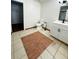 Bathroom with white vanity, modern fixtures, tile flooring, and a toilet at 13046 Prairie Meadows Dr, Orlando, FL 32837
