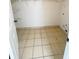 A bright pantry with tile floor and ample shelving for organized storage at 13046 Prairie Meadows Dr, Orlando, FL 32837