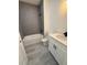 Bathroom showcasing a shower-tub combo with gray tiled walls and a modern vanity sink at 13265 Sw 85Th Cir, Ocala, FL 34473