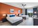 Bright bedroom with two beds, an inviting balcony, and contemporary decor for a comfortable and stylish retreat at 14200 Avalon Rd # 409, Winter Garden, FL 34787