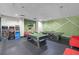 Fun game room includes a pool table, ping pong, arcade games, and colorful decor at 14200 Avalon Rd # 409, Winter Garden, FL 34787