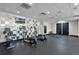 Community gym offers modern equipment, mirrored walls, and a mounted television at 14200 Avalon Rd # 409, Winter Garden, FL 34787