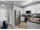 Bright kitchen with stainless steel appliances, plenty of counter space, and an open layout for easy entertaining at 14200 Avalon Rd # 409, Winter Garden, FL 34787