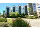 Building with many balconies and mature landscaping at 14501 Grove Resort Ave # 3636, Winter Garden, FL 34787