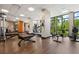 Community gym area featuring state-of-the-art equipment, large windows, and well-lit space for workouts at 14501 Grove Resort Ave # 3636, Winter Garden, FL 34787