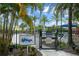 Community pool area entrance showcasing lush landscaping and a resort-style atmosphere for residents at 14501 Grove Resort Ave # 3636, Winter Garden, FL 34787