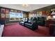 Enjoy movie nights in this home theater featuring tiered seating and a high-quality projection system at 16410 Good Hearth Blvd, Clermont, FL 34711