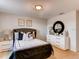 Comfortable bedroom with stylish decor, including a full-length mirror, complementing the room's serene ambiance at 17081 Water Spring Blvd, Winter Garden, FL 34787