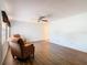 Bright living room featuring new floors, a ceiling fan, and neutral paint, with ample space for furniture at 186 Tulpan Dr, Kissimmee, FL 34743